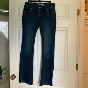 Dark Blue Wrangler jeans. Boot cut, high waisted jeans. Brand new, never worn.